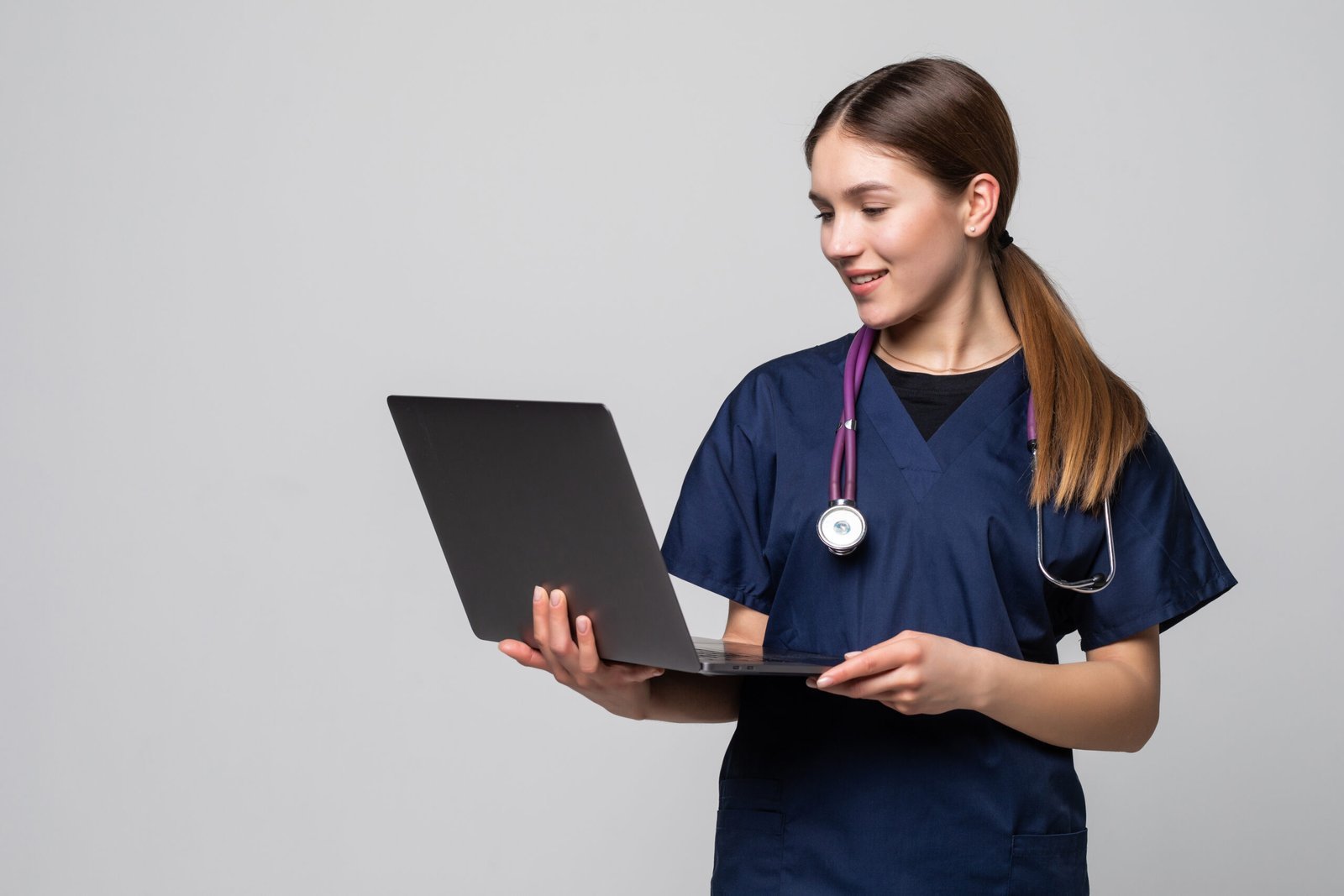A female doctor working isolated on white background